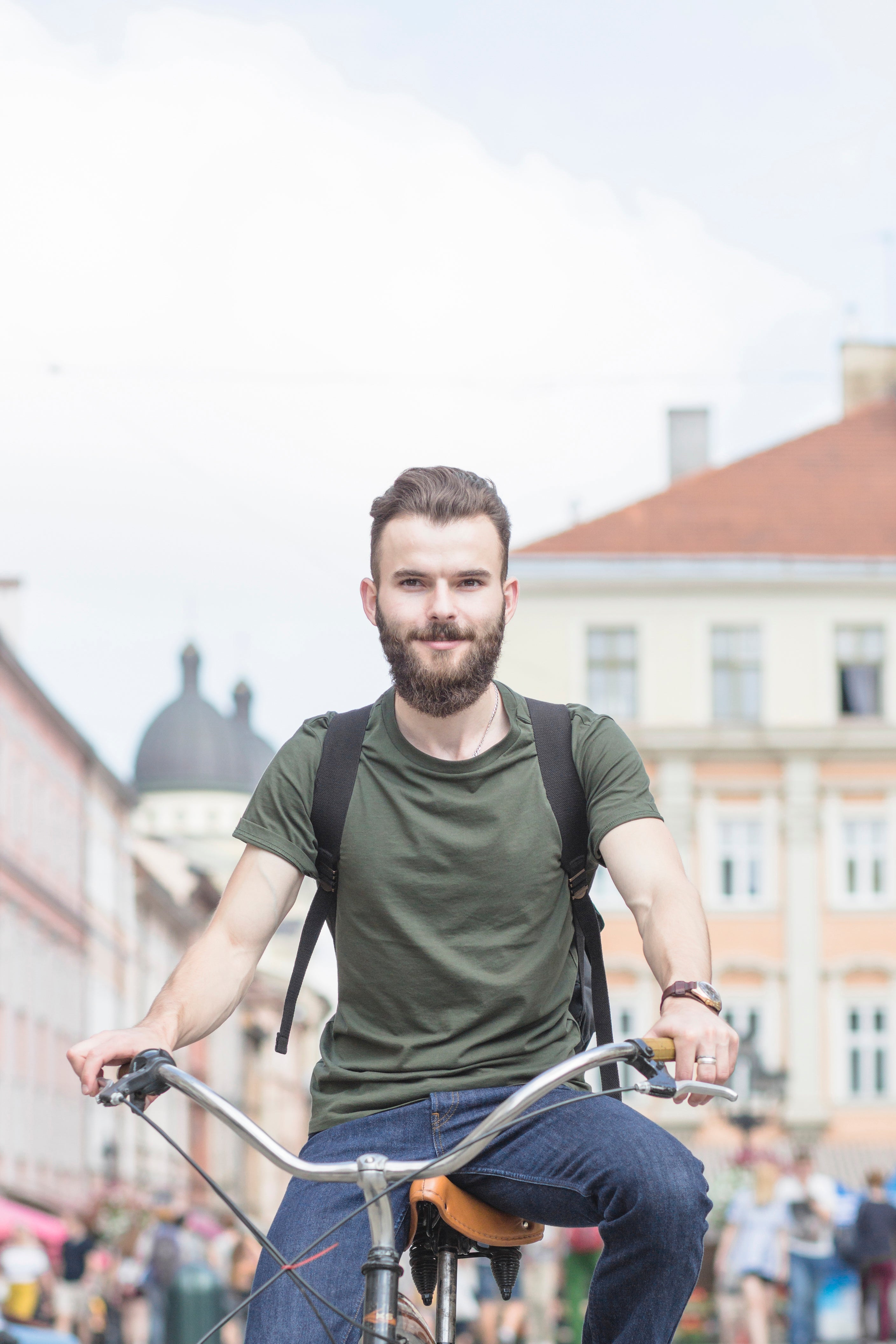 files/portrait-bearded-young-man-riding-bicycle.jpg